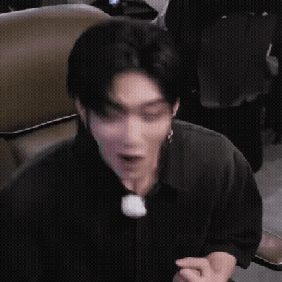 Man In Black Shirt Making Face GIF