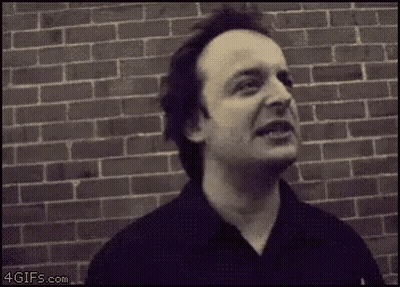 Man In Black Shirt Making Funny Face GIF