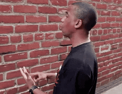 Man In Black Shirt Making Funny Face GIF