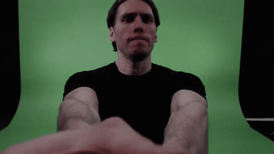 Man In Black Shirt Making Funny Face GIF