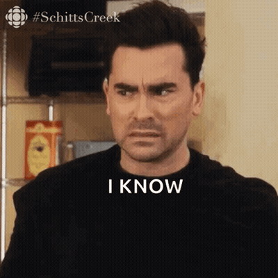 Man In Black Shirt Making Funny Face Saying I Know GIF