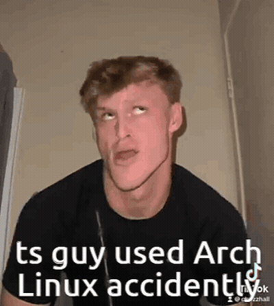 Man In Black Shirt Making Funny Face Says Ts Guy Used Arch Linux Accidentally GIF