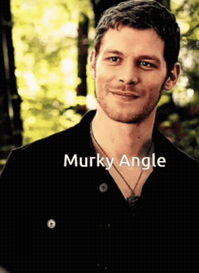 Man In Black Shirt Murky Angle GIF