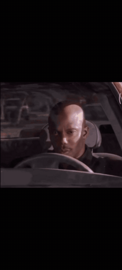 Man In Black Shirt Next To Man In Blue Shirt GIF