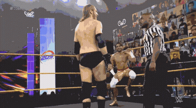 Man In Black Shirt Number 3 Hugging Another Man In Stadium GIF