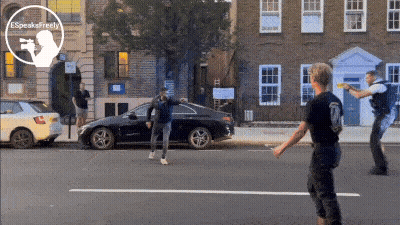 Man In Black Shirt Number 8 Standing On Street GIF