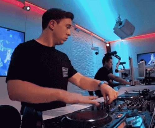 Man in Black Shirt Playing DJ Set