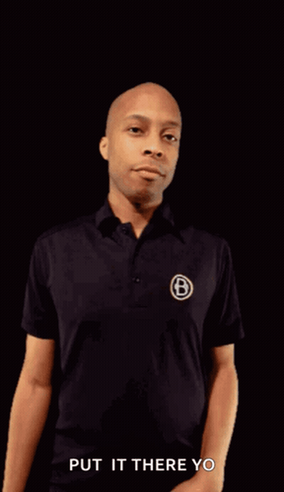 Man In Black Shirt Pointing Fist Put It There Yo GIF