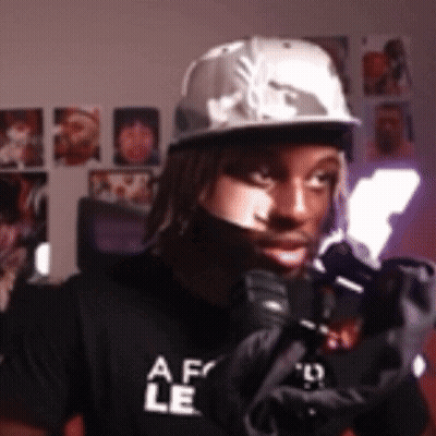 Man In Black Shirt Saying Af Le GIF