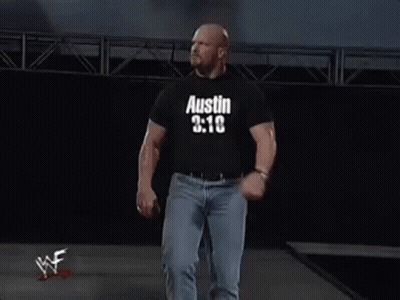 Man In Black Shirt Saying Austin 3:16 Walking Down Stage GIF