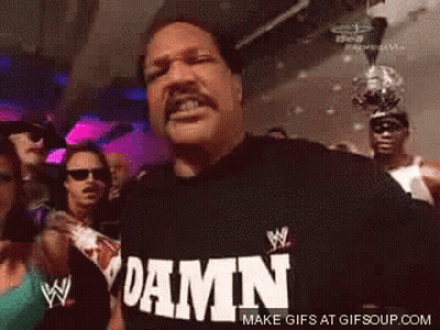 Man In Black Shirt Saying Damn In Crowd GIF