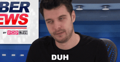 Man In Black Shirt Saying Duh GIF