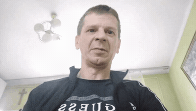 Man In Black Shirt Saying Guess GIF
