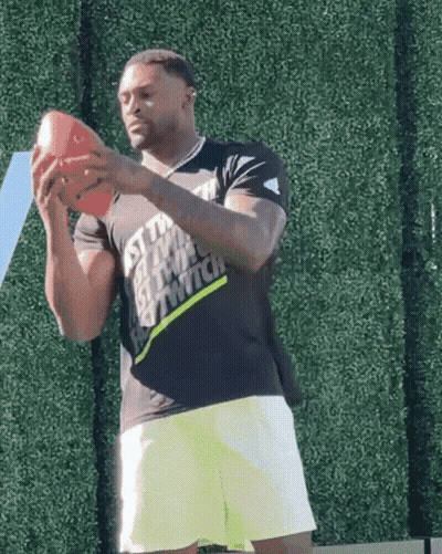 Man In Black Shirt Saying Just Do It Holds Football GIF
