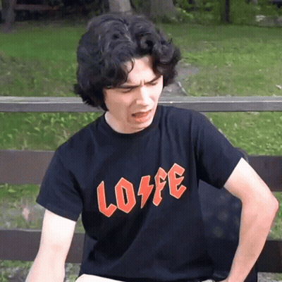 Man In Black Shirt Saying Lose GIF