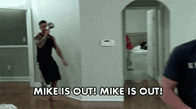 Man In Black Shirt Saying Mike Is Out GIF