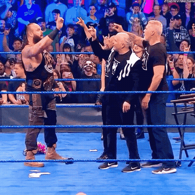Man In Black Shirt Saying New York Walking On Stage GIF