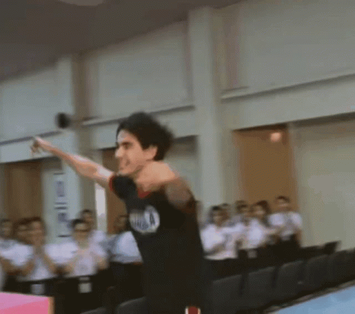 Man In Black Shirt Saying Ninja Doing Trick GIF