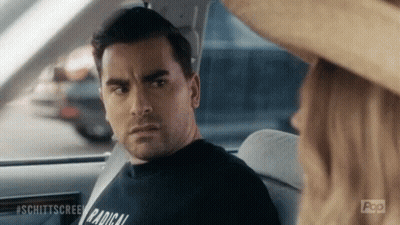 Man In Black Shirt Saying Radical Sits In Car GIF