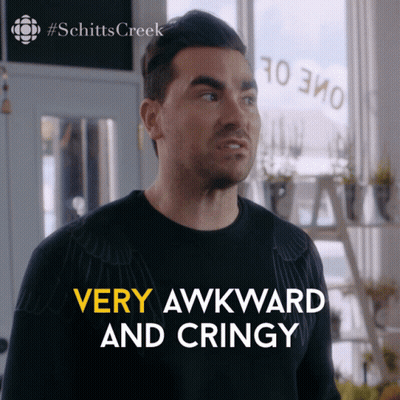 Man In Black Shirt Saying Very Awkward And Cringy GIF
