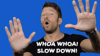 Man In Black Shirt Saying Whoa Whoa Slow Down GIF