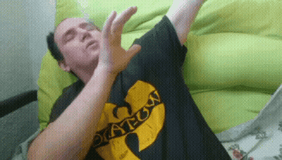 Man In Black Shirt Saying Wu Tang GIF