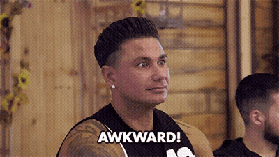 Man In Black Shirt Says Awkward GIF