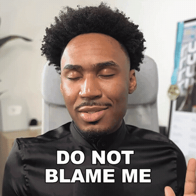 Man In Black Shirt Says Do Not Blame Me Eyes Closed GIF