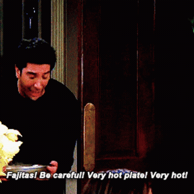 Man In Black Shirt Says Fajitas Be Careful Very Hot Plate GIF