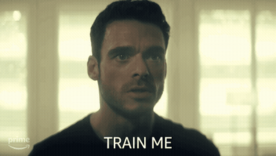 Man In Black Shirt Says Train Me In Front Of Prime Logo GIF
