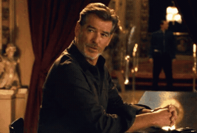 Man In Black Shirt Sitting At Bar GIF