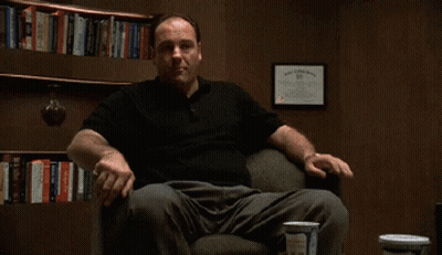 Man In Black Shirt Sitting With Bingo GIF