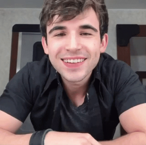 Man In Black Shirt Smiling GIF
