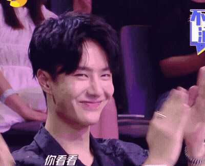 Man In Black Shirt Smiling And Clapping GIF