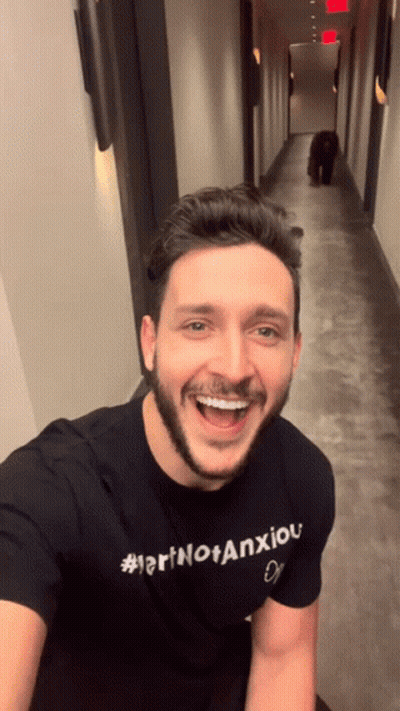 Man In Black Shirt Smiling #Larinotanxiou GIF
