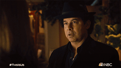 Man In Black Shirt Smiling With NBC Logo GIF