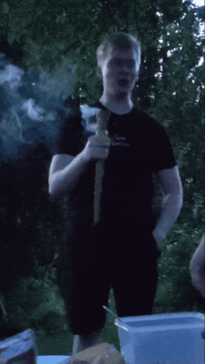 Man In Black Shirt Smoking Cigarette GIF