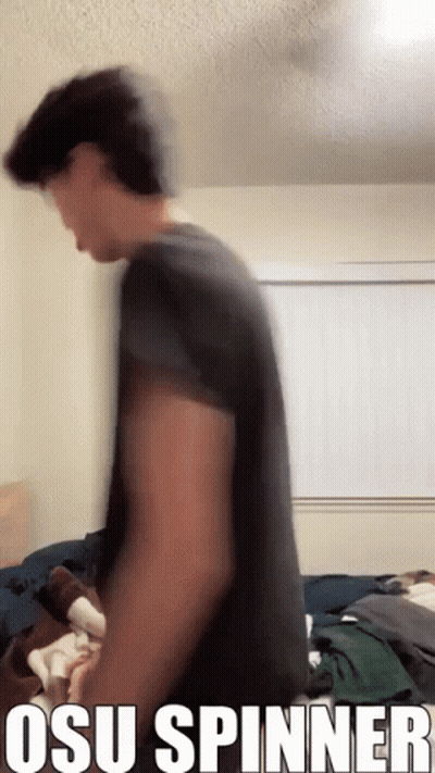 Man In Black Shirt Standing At Window Osu Spinner GIF