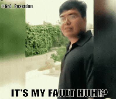 Man In Black Shirt Standing Before Fault Sign GIF