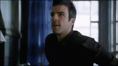 Man In Black Shirt Standing GIF