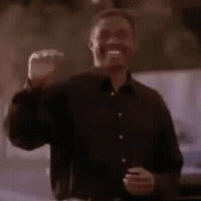 Man In Black Shirt Standing In Front Of Car GIF