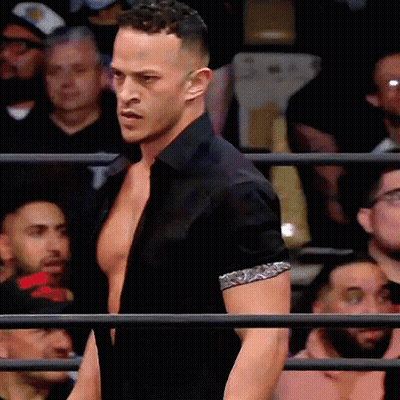 Man In Black Shirt Standing In Ring GIF