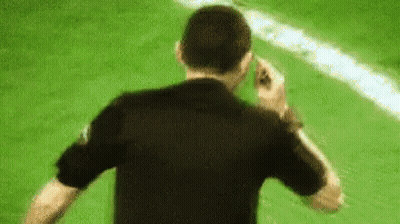 Man In Black Shirt Standing On Field GIF