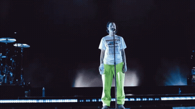 Man In Black Shirt Standing With Arms Crossed GIF