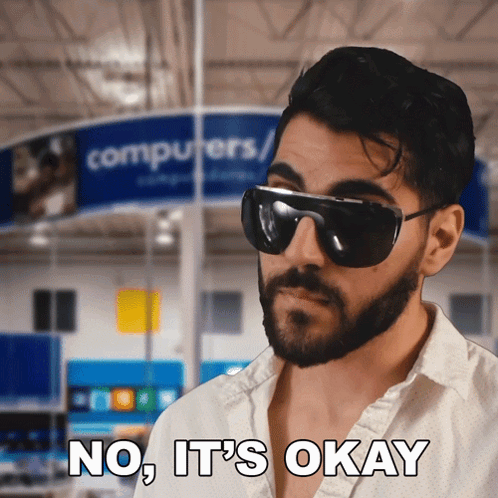 Man In Black Shirt Talking On Phone GIF