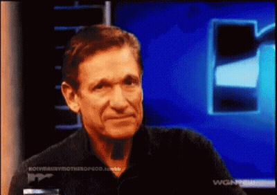 Man In Black Shirt Talking On TV GIF
