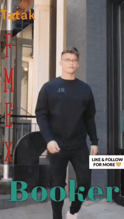 Man In Black Shirt Walking Down Street Booker GIF