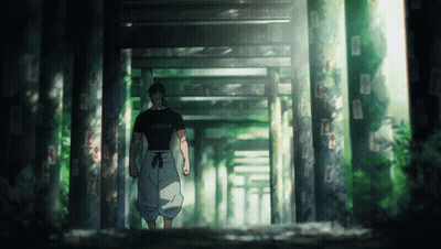 Man In Black Shirt Walking Through Tunnel GIF