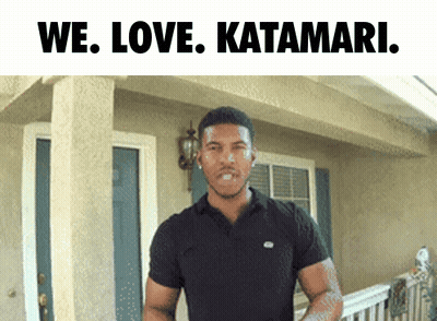 Man In Black Shirt We Love Katamari In Front Of House GIF