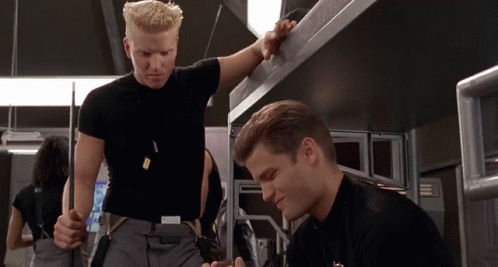 Man In Black Shirt With Badge Saying A GIF